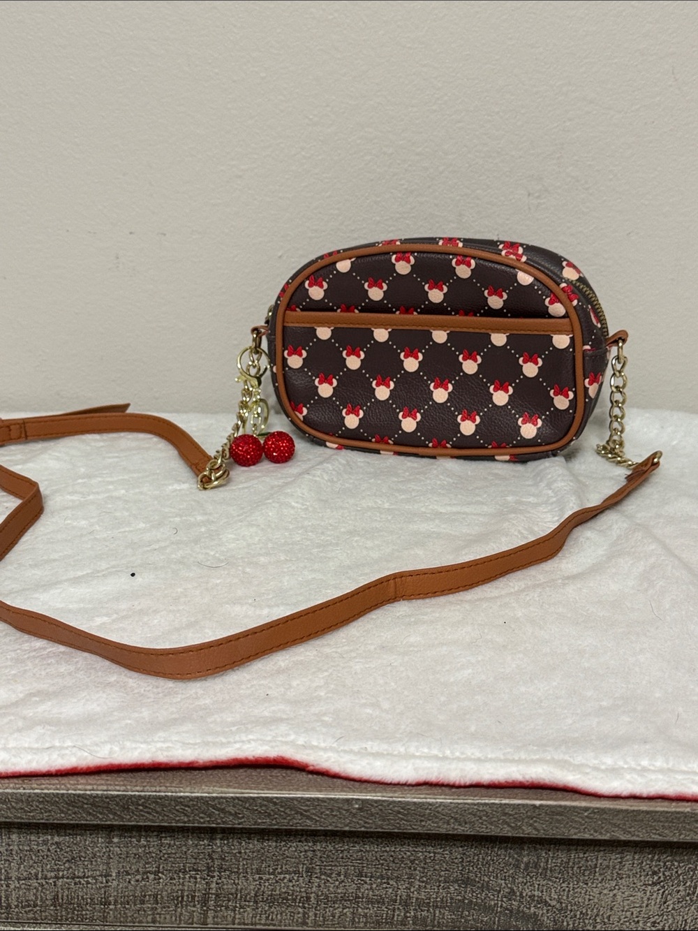 Disney Minnie Mouse Women’s Brown Crossbody Bag with Red Bow Print